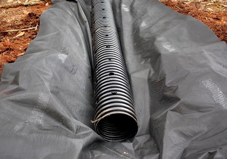 Дренажные трубы для отвода грунтовых вод: материалы, технология изготовления, особенности монтажа